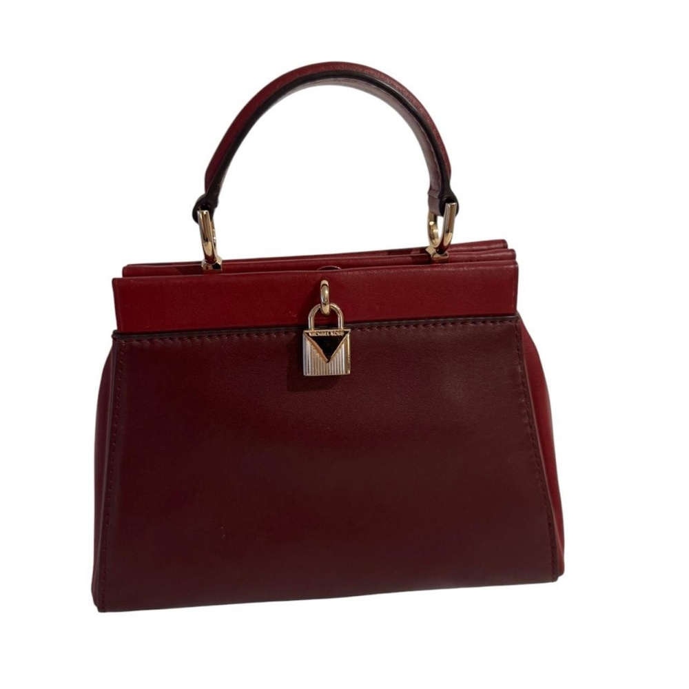 Burgundy leather handbag in great condition with shoulder strap and dust bag